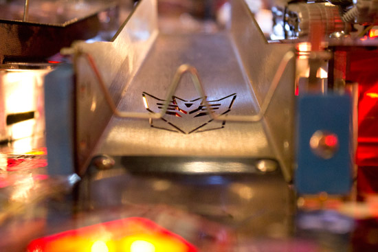 The laser-cut logo on the left ramp