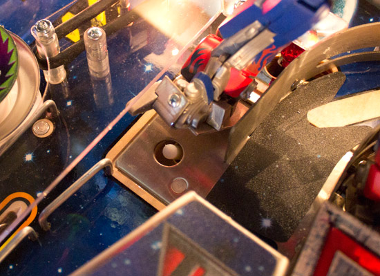The solenoid's plunger beneath Optimus's right foot