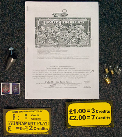 The manual, lamps, decals, cards and tilt bob