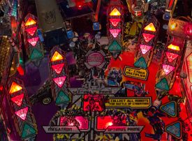 The Autobot and Decepticon inserts flash