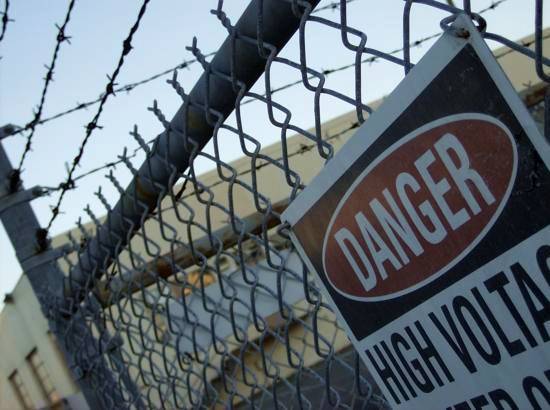 Barbed wire and electrified fences
