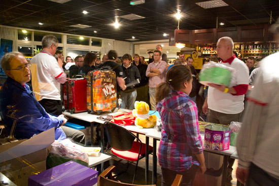 The crowd watches the raffle draw