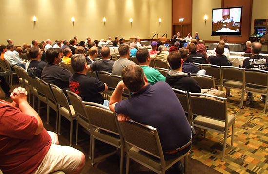 The audience listen the the fireside chat