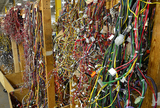 Despite the Spike system using fewer cables, there are still rack of them in the factory