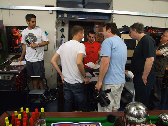 Players come to collect their score sheets