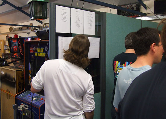 A player examines the results so far