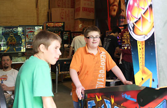 Josh Henderson showing Keegan Rufer some tips in the practice bank of games