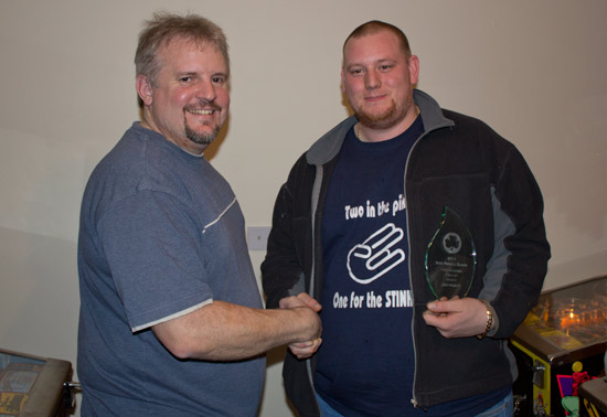 Matt receives his second place trophy from Andy