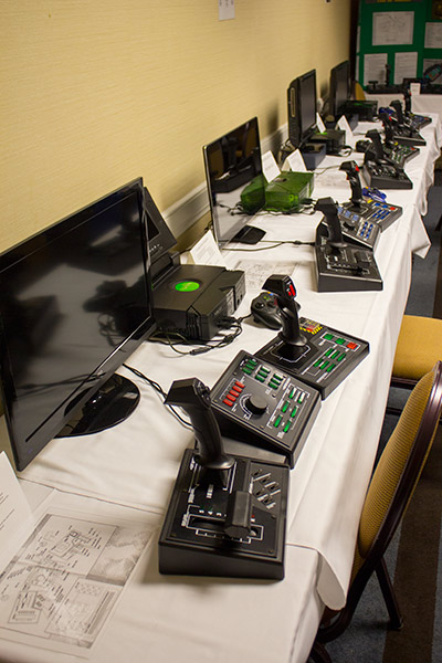 The E2M Home Arcade room gets ready to show their game controllers