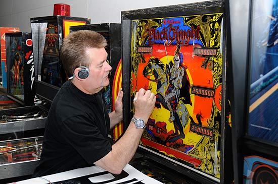 Steve signs a Black Knight backglass