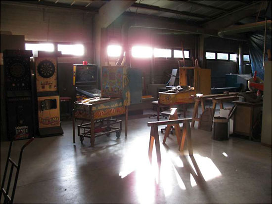 Bingos, pinballs and darts alongside woodworking machines which still need to be covered up!