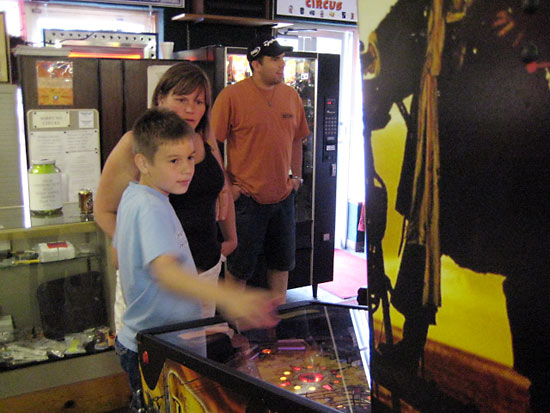 Mother and son sharing the wonder of their first game together