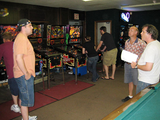 Three fellows cordially deciding player order