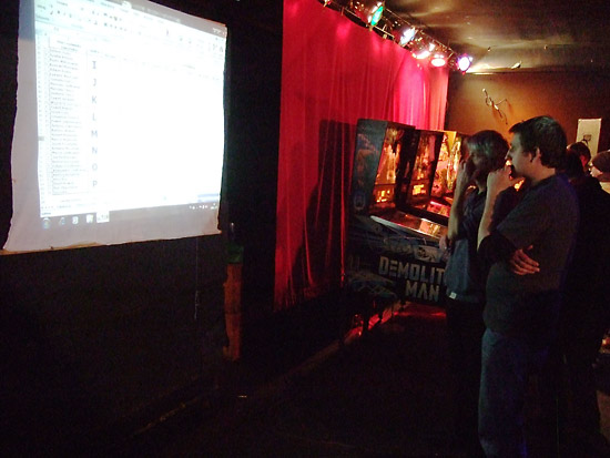 Head of the club Spoldzielnia CDQ, Jarek Gula, and Pawel Nowak watch the results
