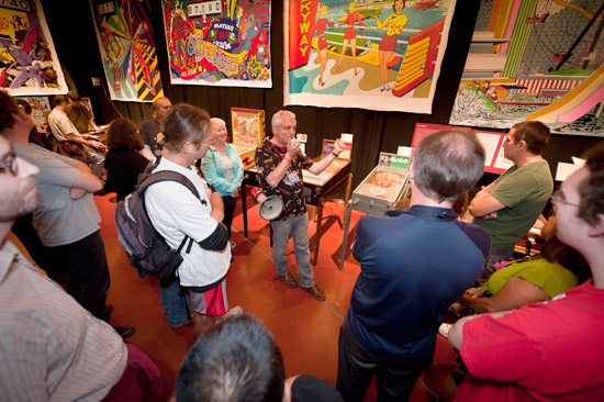 Dan Miller shows another group of visitors around the historically significant machines