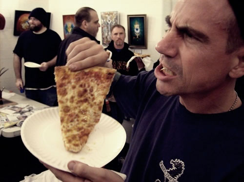 I told Gem to eat pizza and look angry and he angrily obliged. Gem Gruber is also a principal of the Pacific Pinball Museum.