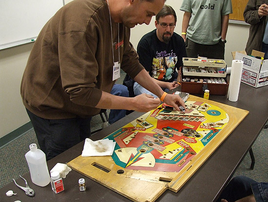 Kevin working on a playfield