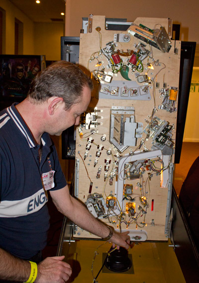 Phil shows the underside of the playfield