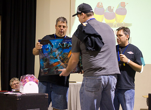 A lucky winner collects his 3D Avatar translite