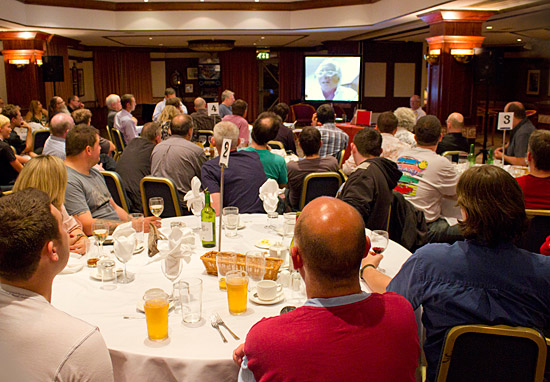 The audience listens to Gary's acceptance speech