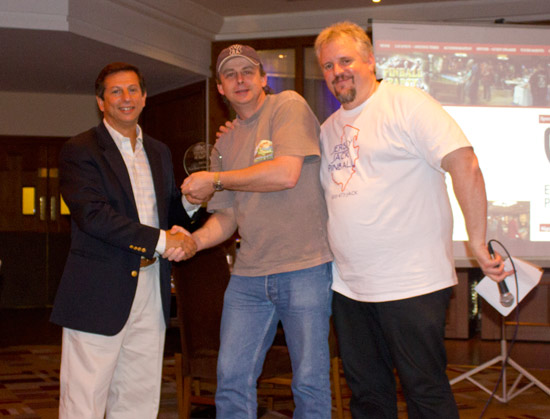 Darren Ball receives the first of his two awards