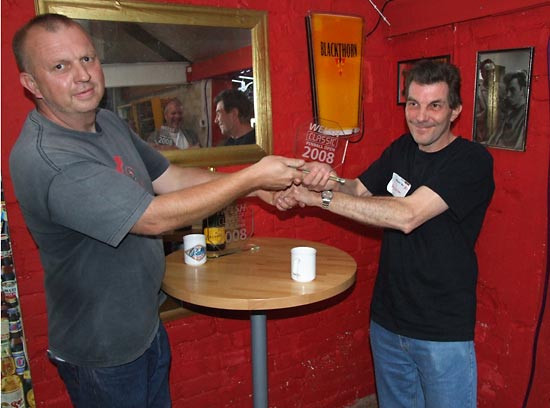 Second placed Terry Sullivan collects his rewards