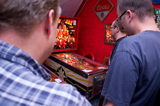 Dave and Nick watch as Stan sizes-up Flash Gordon
