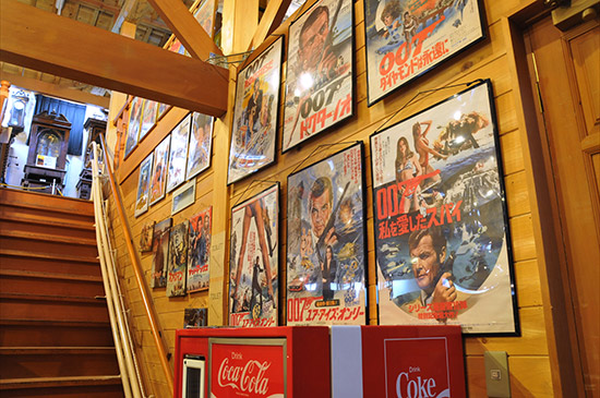 Movie posters line the stair walls