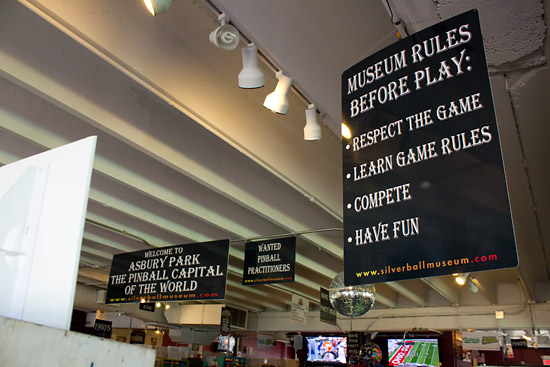 Lots of signs hanging from the ceiling