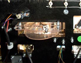 Behind the back panel