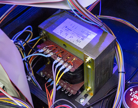 The transformer in the base of the cabinet