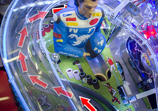 The left orbit lane continues up to the top of the playfield