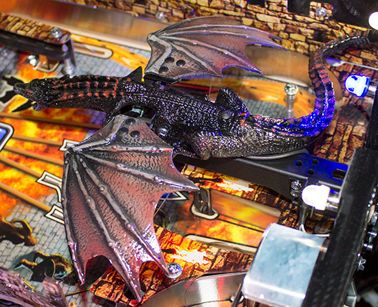 Drogon sits on a metal beam which contains a rotating drive shaft