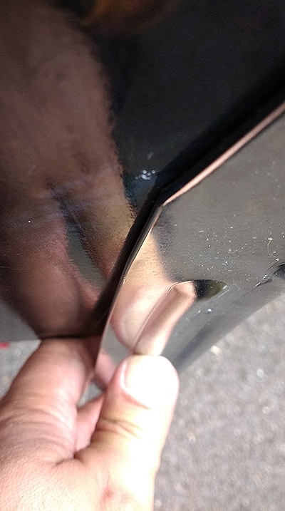 The corner of the leg had already dug into the cabinet
