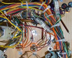 The underside of the playfield at the rollover lanes