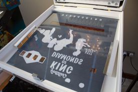 The backglass frame folds down