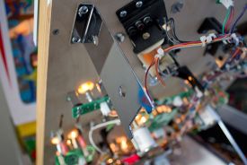 One of the playfield rest brackets