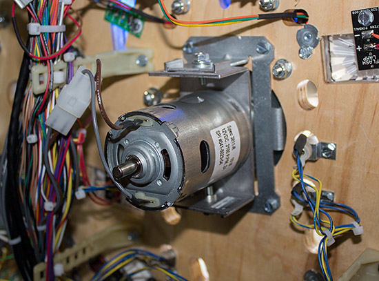 The motor and gearbox for the spinning disc below The Demon