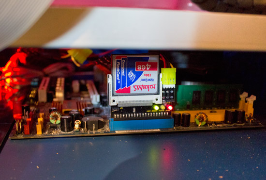 The OS and game code is stored on a Compact Flash card
