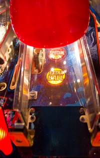 Extra ball and special inserts are under the right ramp