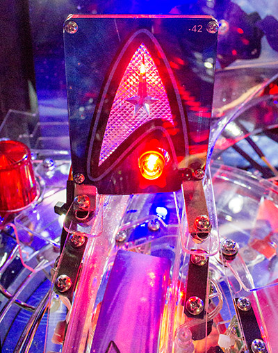 The Starfleet emblem over the Warp ramp