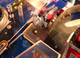 The solenoid's plunger beneath Optimus's right foot