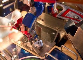 Optimus's right foot has a metal plate