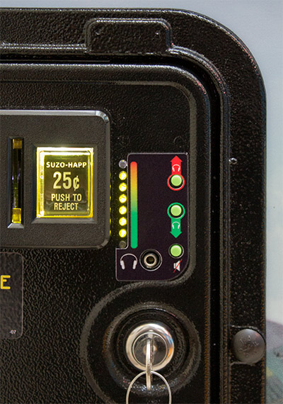 The coin door audio controls
