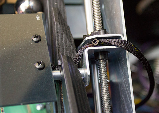 Where the carriage attaches to the thread