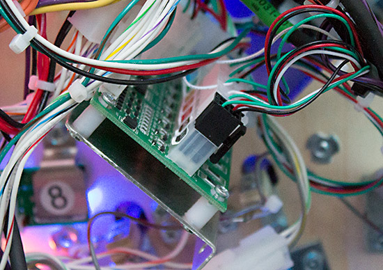 One of the RGB LED controller boards under the playfield