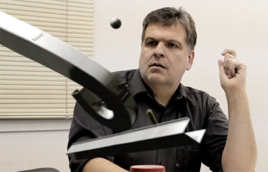 The metal parts fly off Lonnie's desk