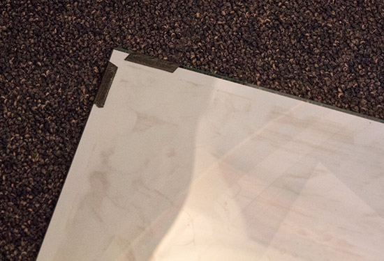 Black electrical tape holds the translite in place