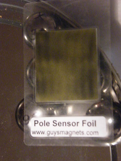 Dark blemishes from magnetised pinballs on pole sensor foil