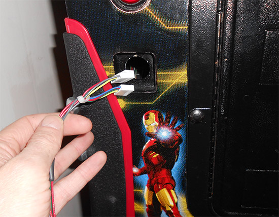Push the cable and connectors through from the front
